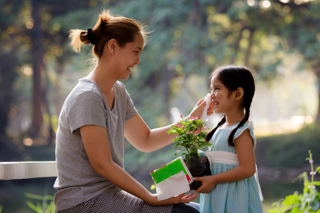 a mother spending time with her daughter outdoors