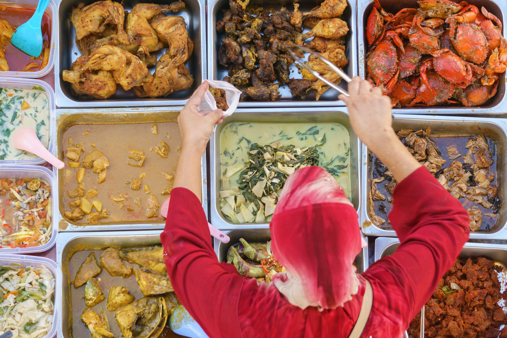 Eatery with home-cooked dishes on display.