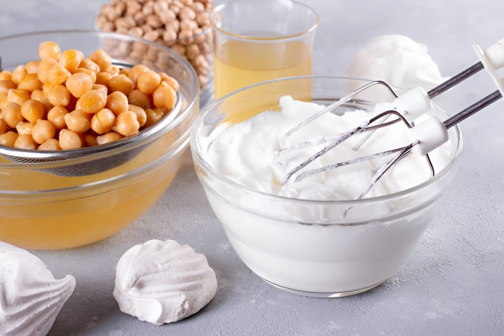 chickpeas, aquafaba, and meringue mixture in a bowl