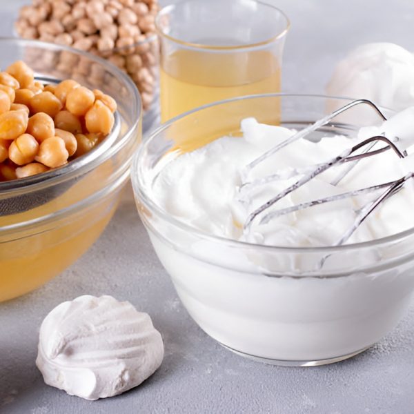 chickpeas, aquafaba, and meringue mixture in a bowl